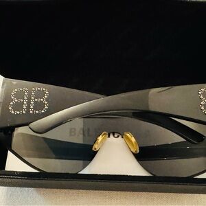 Balenciaga sunglasses in a Black Textured Leather Eyewear Sleeve
